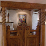 Carved swining door made by Nicolai Fechin
