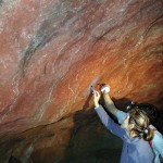 Researchers removing samples from paintings