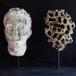 Plaster head from the U.S., maker unknown, circa 1950 and Missouri River rock, found natural stone, no date;