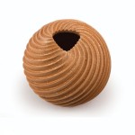 Dominique Toya (Jemez Pueblo), micaceous melon swirl pot.