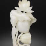 A jade lotus vase, 18th century, 17.2 cm.;
