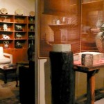 A sitting room features a variety of small and large jade objects.
