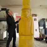 Preston Singletary in the studio with his totem pole;