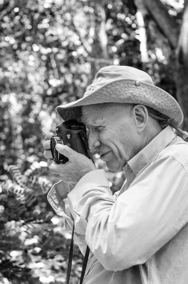 Sebastião Salgado photographing.