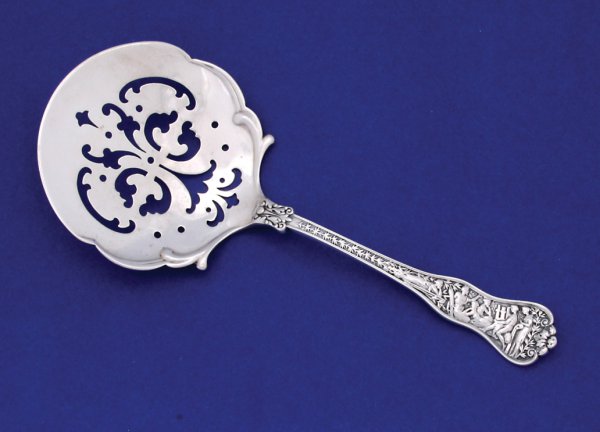 Tiffany & Co., tomato server with Olympia pattern.