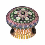 Clichy piedouche paperweight with amber staves.