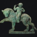 Striding lion ridden by Eros or child Dionysos