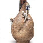 Ishiguro Koko, sake bottle with moulded porcelain figures of three boys