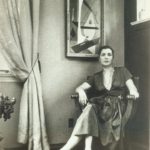 Esphyr Slobodkina seated in front of Irish Elegy