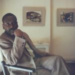 Jacob Lawrence with panels 26 and 27 from Struggle: From the History of the American People, 1954–56.